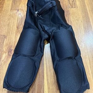 RIDDELL FOOTBALL PANTS.